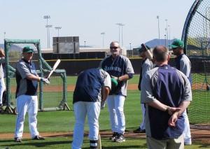 L-R Kyle Seager, Kendrys Morales (bending), Eric Wedge and Franklin Guttierez