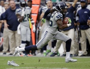 Richard Sherman runs out of his shoe on way to end zone...