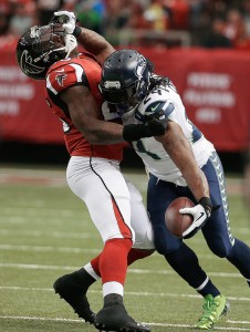"Beast Mode" stiff arm!