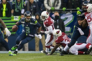 Russell Wilson scrambling from pressure