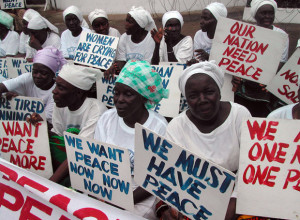 Muslim and Christian Liberian women protesting for peace