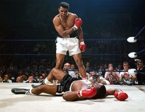 Muhammad Ali standing over the defeated Sonny Liston