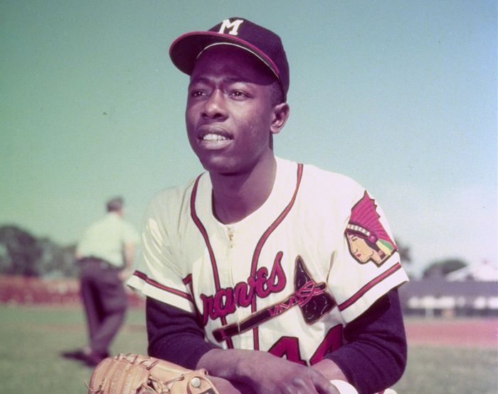 Hank Aaron sitting next to some old man named Satchel Paige : r/baseball